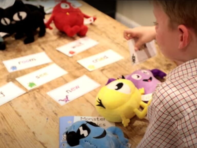 Learning at home with monster phonics flashcards and toys